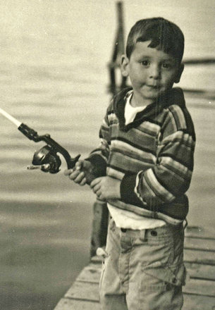 Kyle Haver as a boy, fishing from a wooden dock on Lake Buel, about 1961